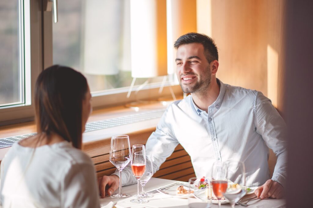 imgi 168 young couple holding two glasses of aperitivo royalty free image 636028678 1563770810