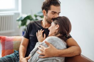 imgi 170 man embracing girlfriend while kissing on her royalty free image 974230298 1563771583